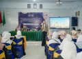 Sosialisasi Program Makan Bergizi Gratis (MBG) yang dilaksanakan di SMP Wachid Hasyim 10 Prambon, Sidoarjo.